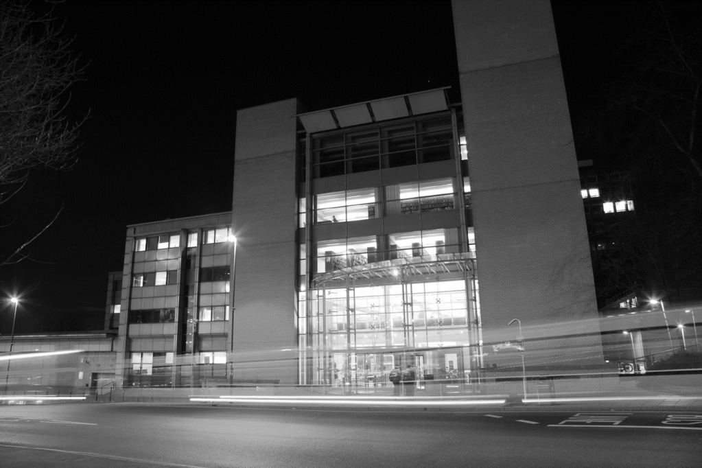 Black and white photograph of the outside of Leeds Beckett Library at Leeds Beckett City Campus